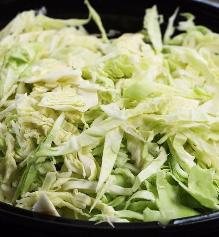 Dump cabbage and these ingredients in slow cooker for a meal guests will crave over and and over